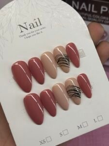 Dusty Rose Abstract Nude Almond Nails